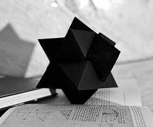 Geometric Shadows and Origami Symmetry - Polyhedra Origami